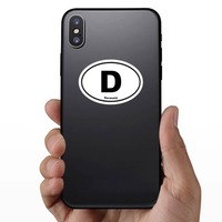 Germany D Oval Sticker on a Phone example